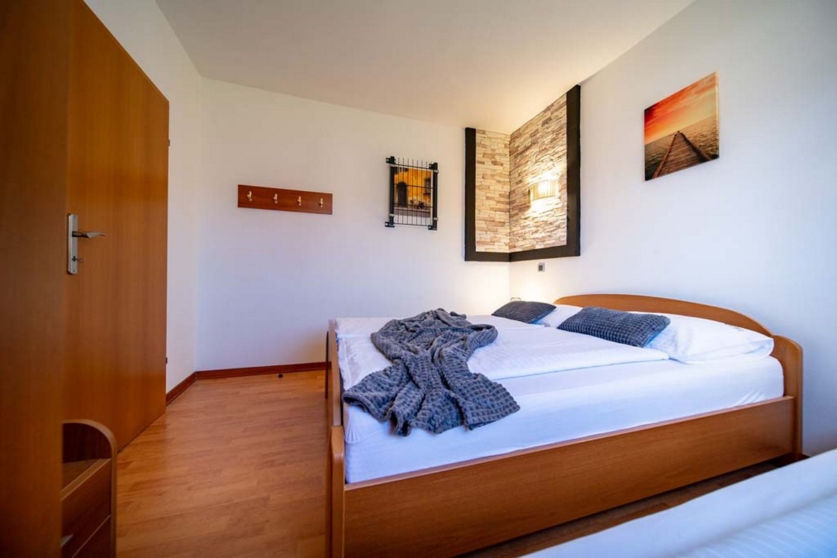 Two bedroom apartment with terrace Lopar, Rab  A-d