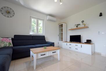 Risika, Living room in the house, air condition available and WiFi.