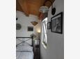 Valun, Dormitorio in the studio-apartment, air condition available y WiFi.