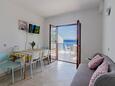 Dining room Prigradica, Dining room in the apartment, air condition available, (pet friendly) and WiFi.