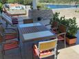 Terrace Nečujam, Terrace in the apartment, with a sea view and WiFi.