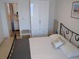 Kneža, Bedroom 1 in the apartment, air condition available and WiFi.
