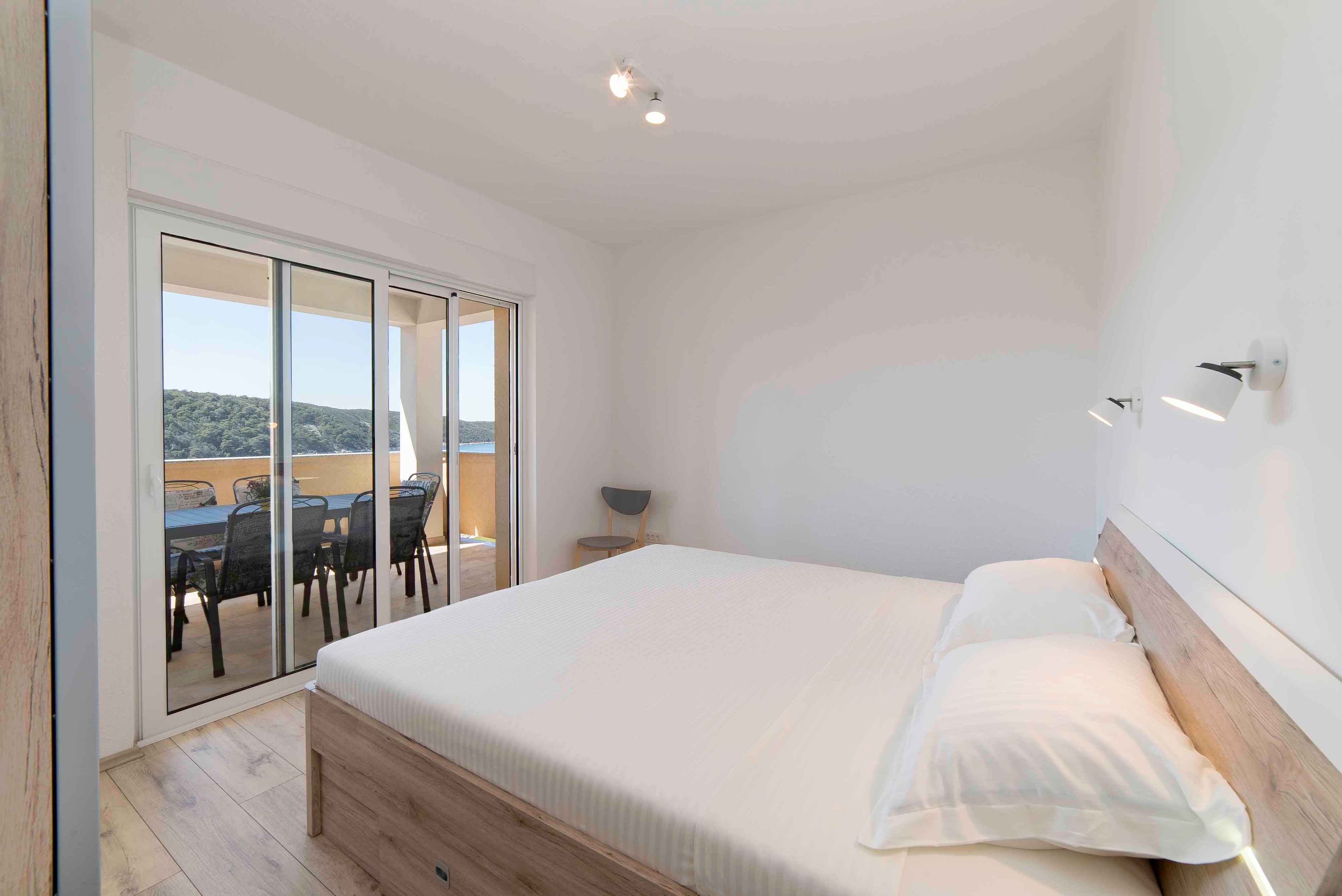 Two bedroom apartment with balcony and sea view Kampor, Rab  A-a