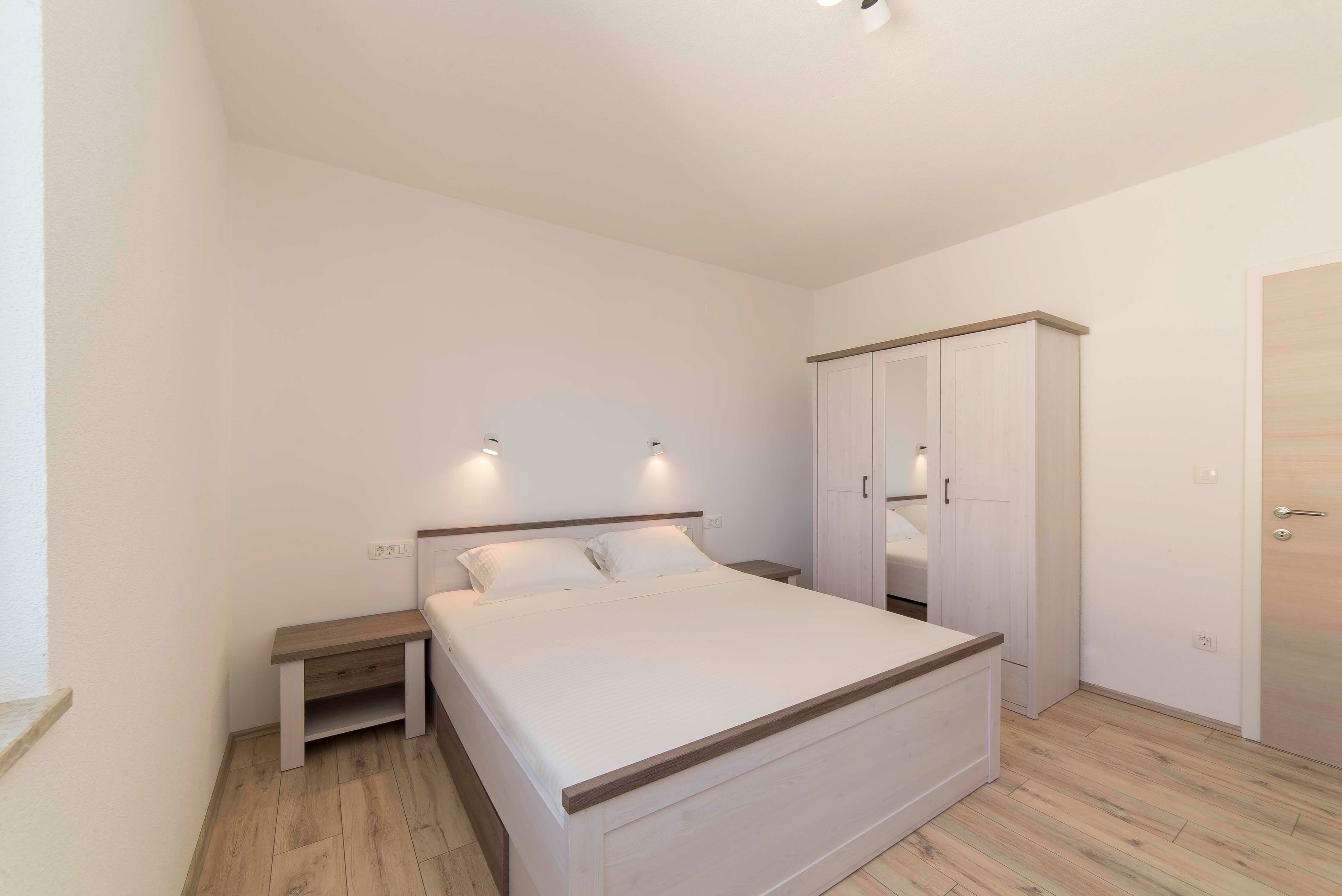 Two bedroom apartment with balcony and sea view Kampor, Rab  A-b