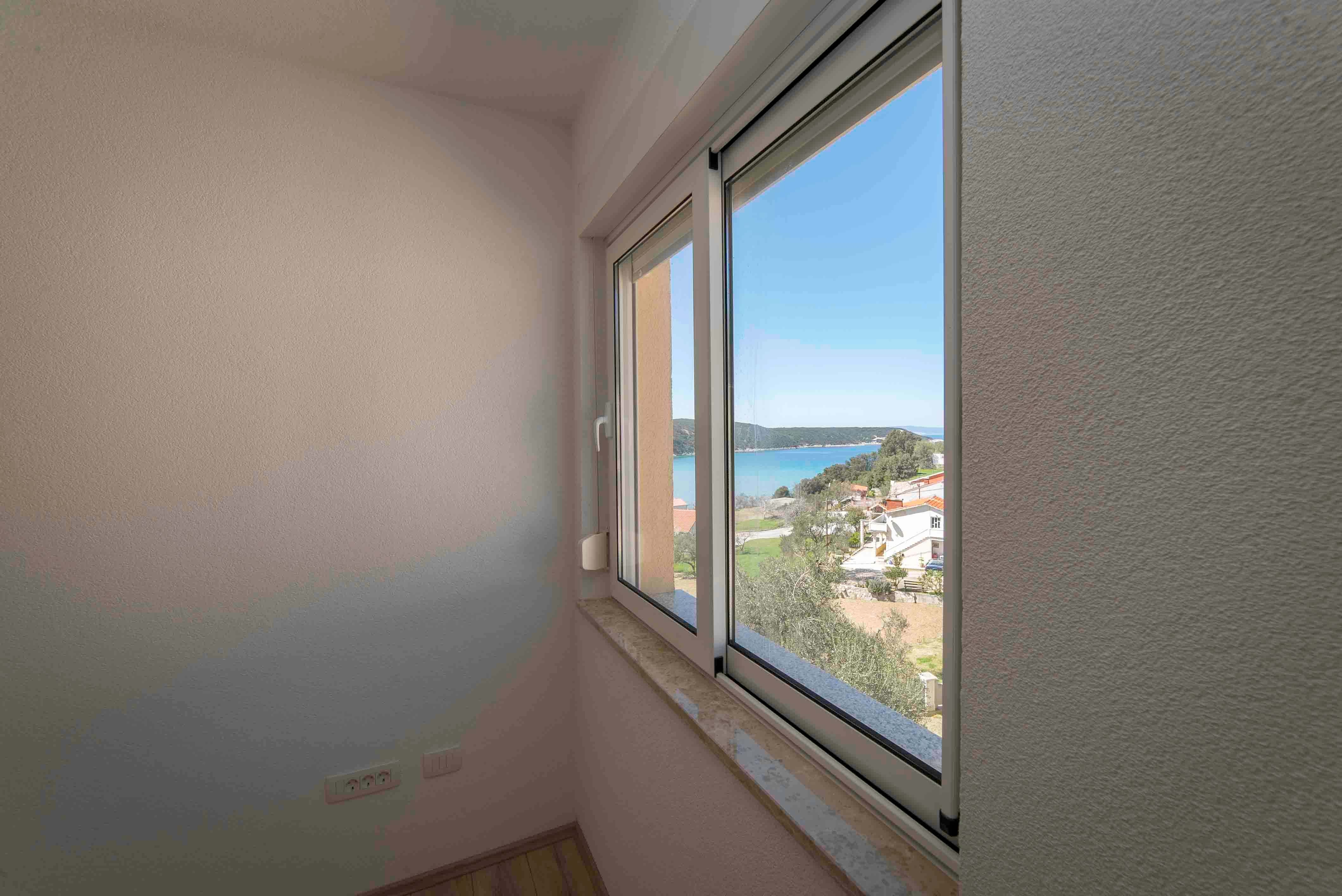 Two bedroom apartment with balcony and sea view Kampor, Rab  A-b