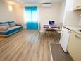 Makarska, Woonkamer in the apartment, air condition available en WiFi.