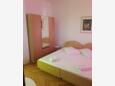 Ložnice Sumpetar, Ložnice v ubytování typu room, s klimatizací a WiFi.