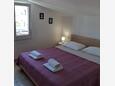 Ložnice Novalja, Ložnice v ubytování typu studio-apartment, s klimatizací, domácí mazlíčci povoleni a WiFi.
