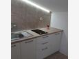 Kuchyně Novalja, Kuchyně v ubytování typu studio-apartment, domácí mazlíčci povoleni a WiFi.