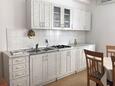 Kitchen Novalja, Kitchen in the apartment, air condition available and WiFi.