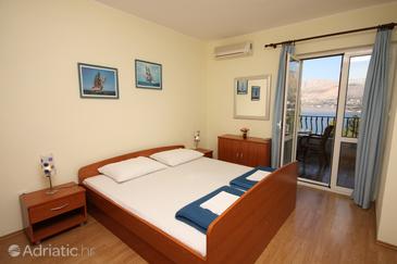Bedroom Cavtat, Bedroom in the room.