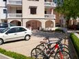 Novalja, Pag, Parkeerplaats 212 - Appartementen with pebble beach.