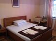 Cavtat, Bedroom 1 in the apartment, air condition available and WiFi.