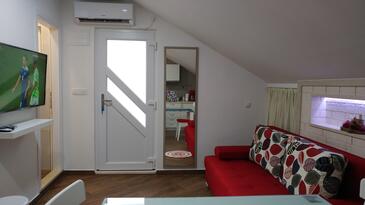 Plat, Woonkamer in the studio-apartment, air condition available en WiFi.