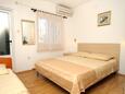 Ložnice Slano, Ložnice v ubytování typu studio-apartment, s klimatizací, domácí mazlíčci povoleni a WiFi.