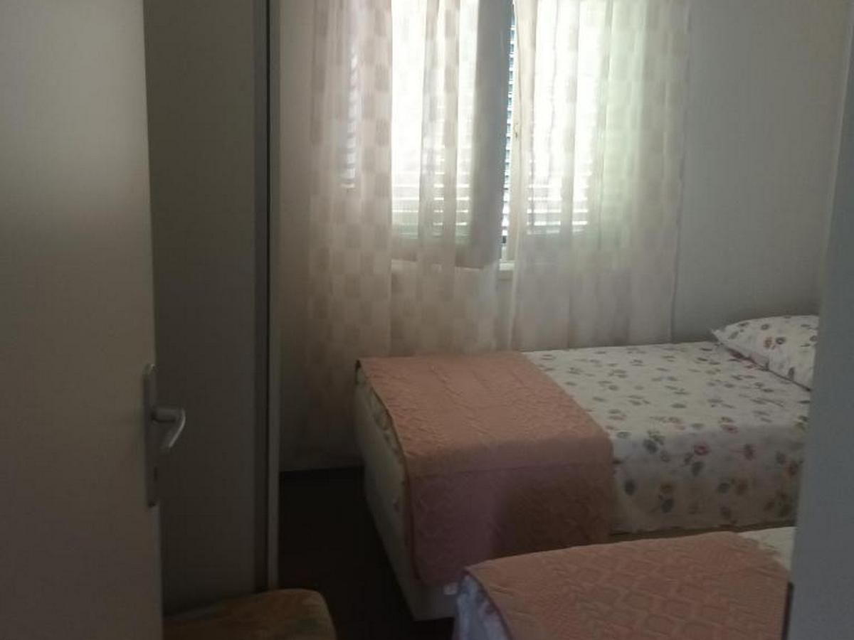 Two bedroom apartment with terrace and sea view Nečujam, Šolta  A-a