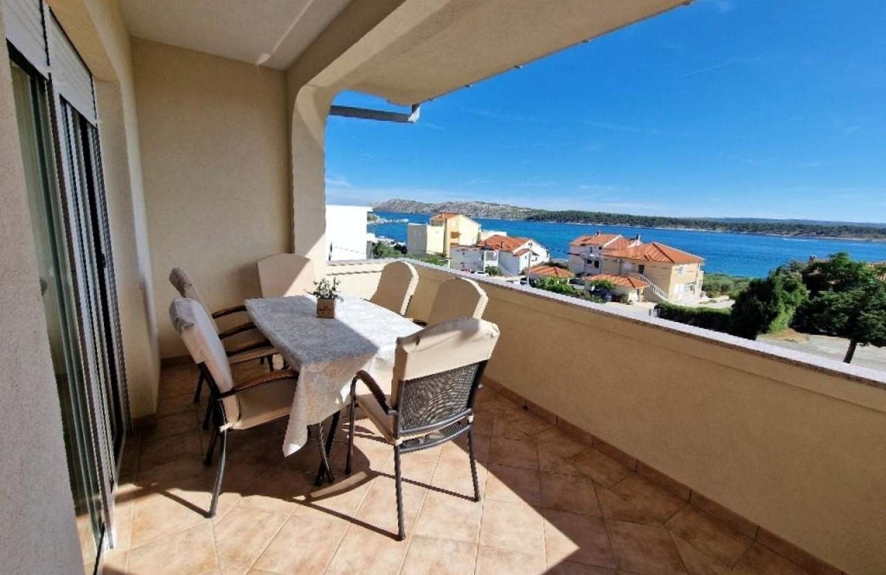 Three bedroom apartment with terrace and sea view Barbat, Rab (A-21809-a)