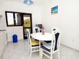 Prižba, Dining room in the apartment, air condition available, (pet friendly) and WiFi.