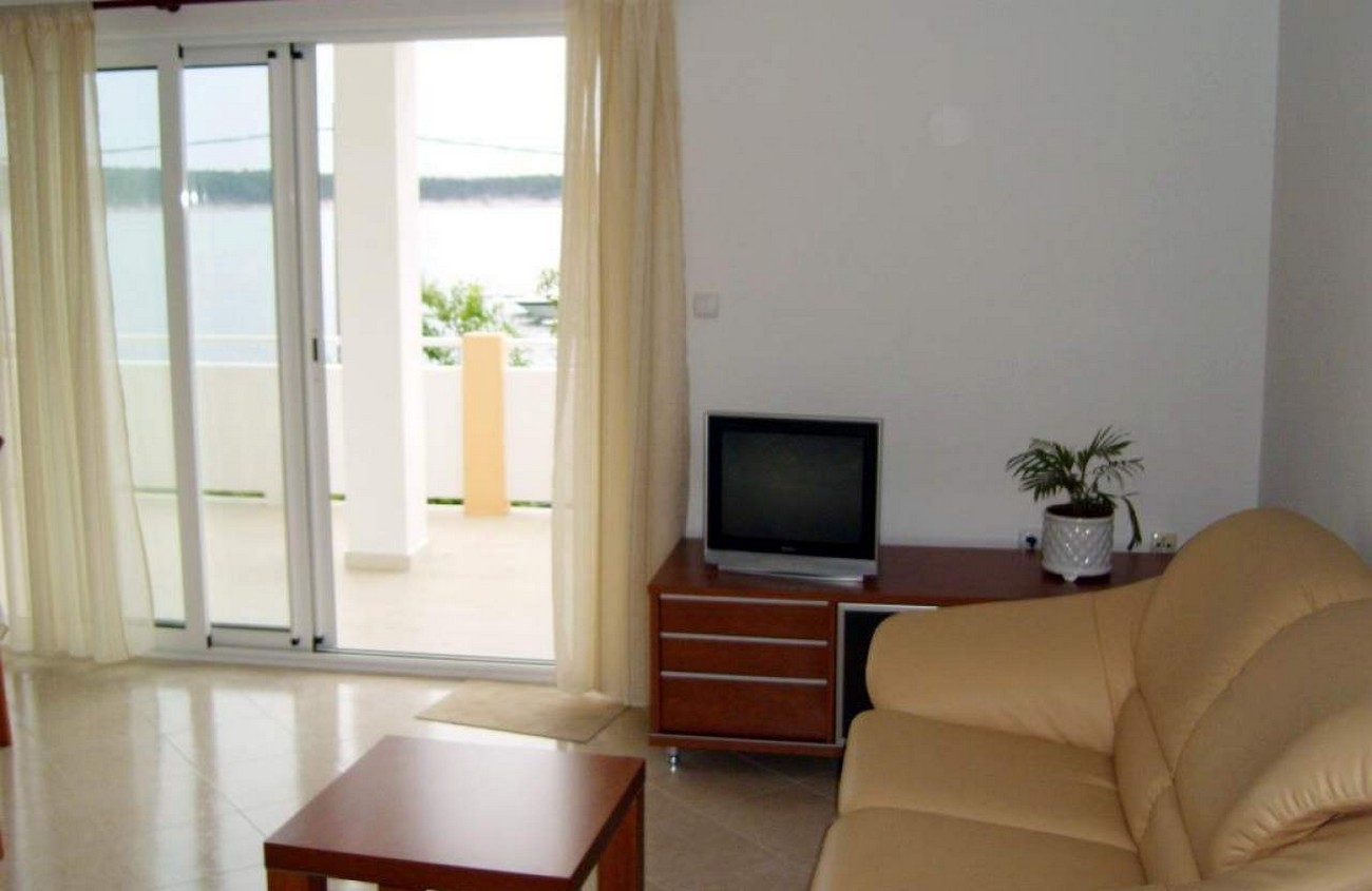 Two bedroom apartment with terrace and sea view Barbat, Rab (A-22053-a)