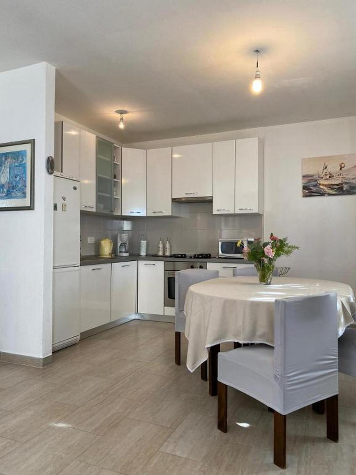 Two bedroom apartment with terrace and sea view Postira, Brač  A-a
