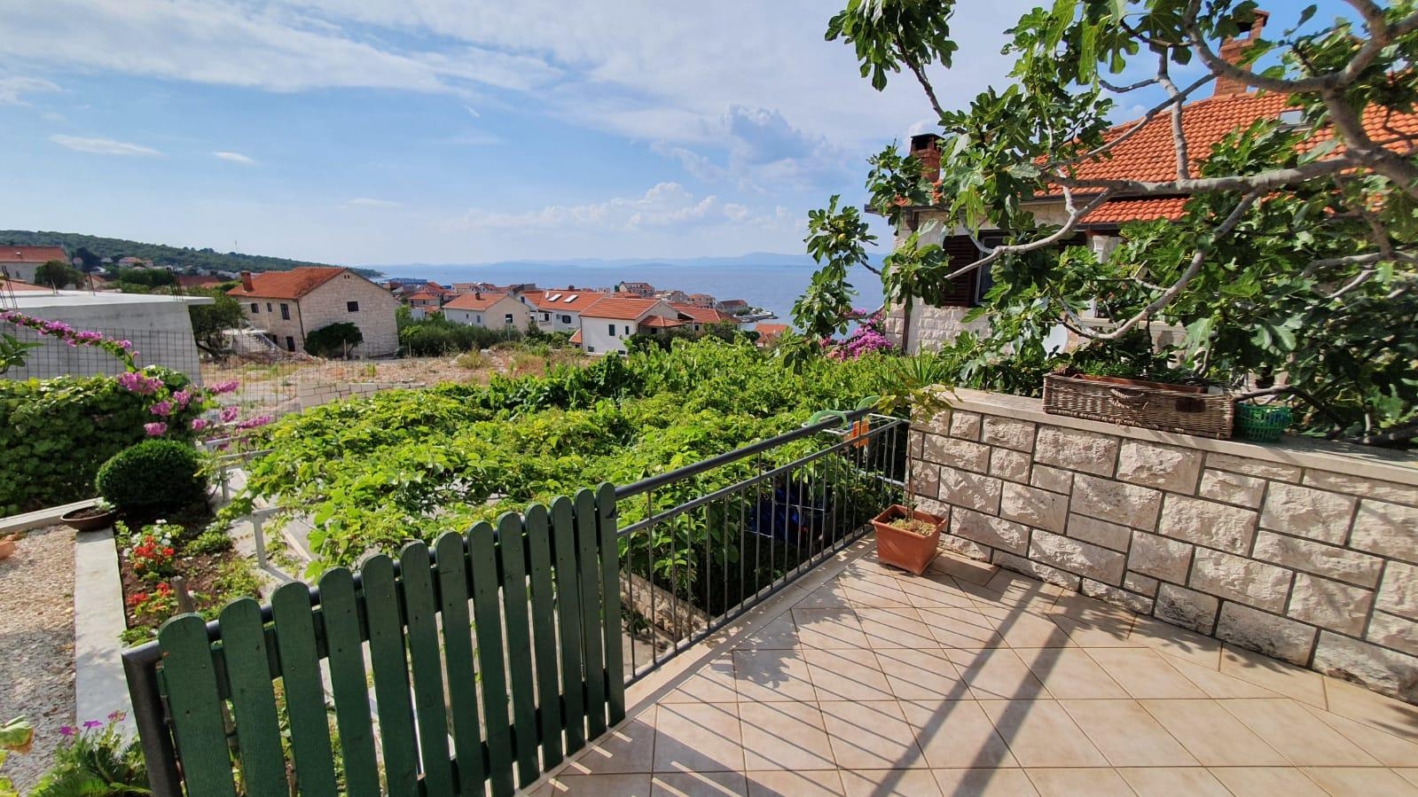 Two bedroom apartment with terrace and sea view Postira, Brač  A-a