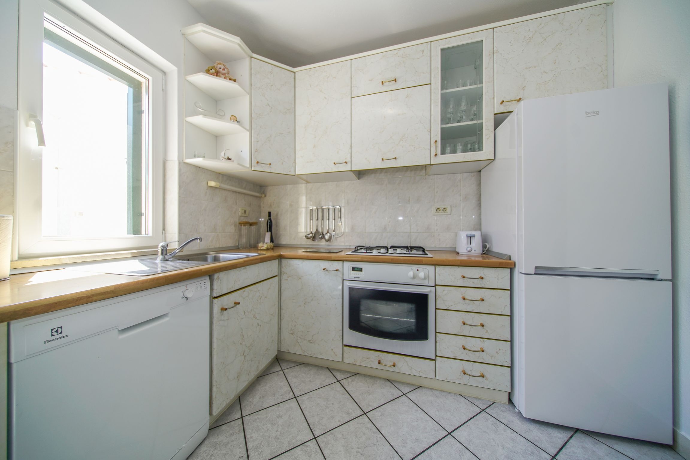 Three bedroom apartment with air-conditioning Postira, Brač  A-a