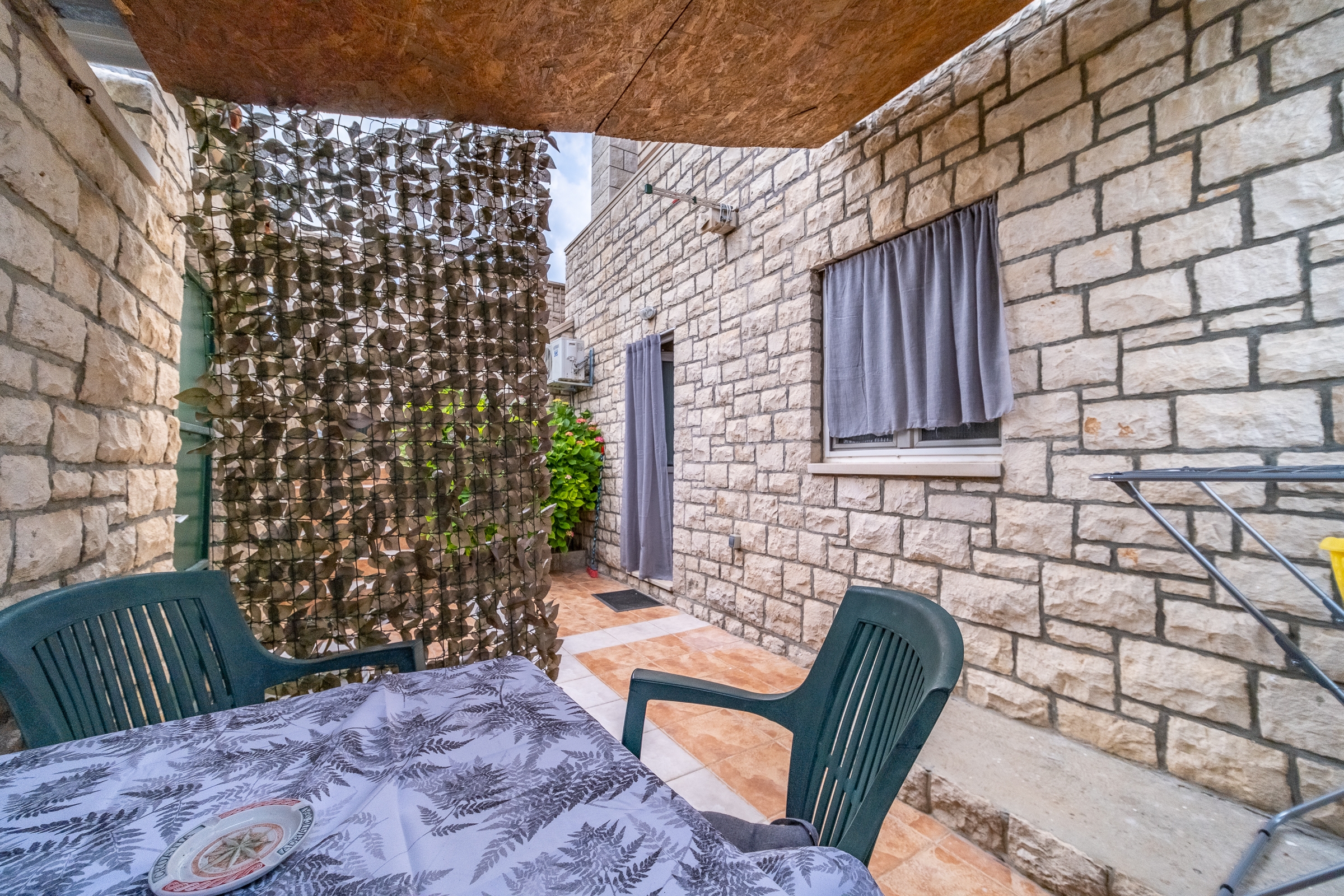 Studio flat with terrace Postira, Brač  AS-a
