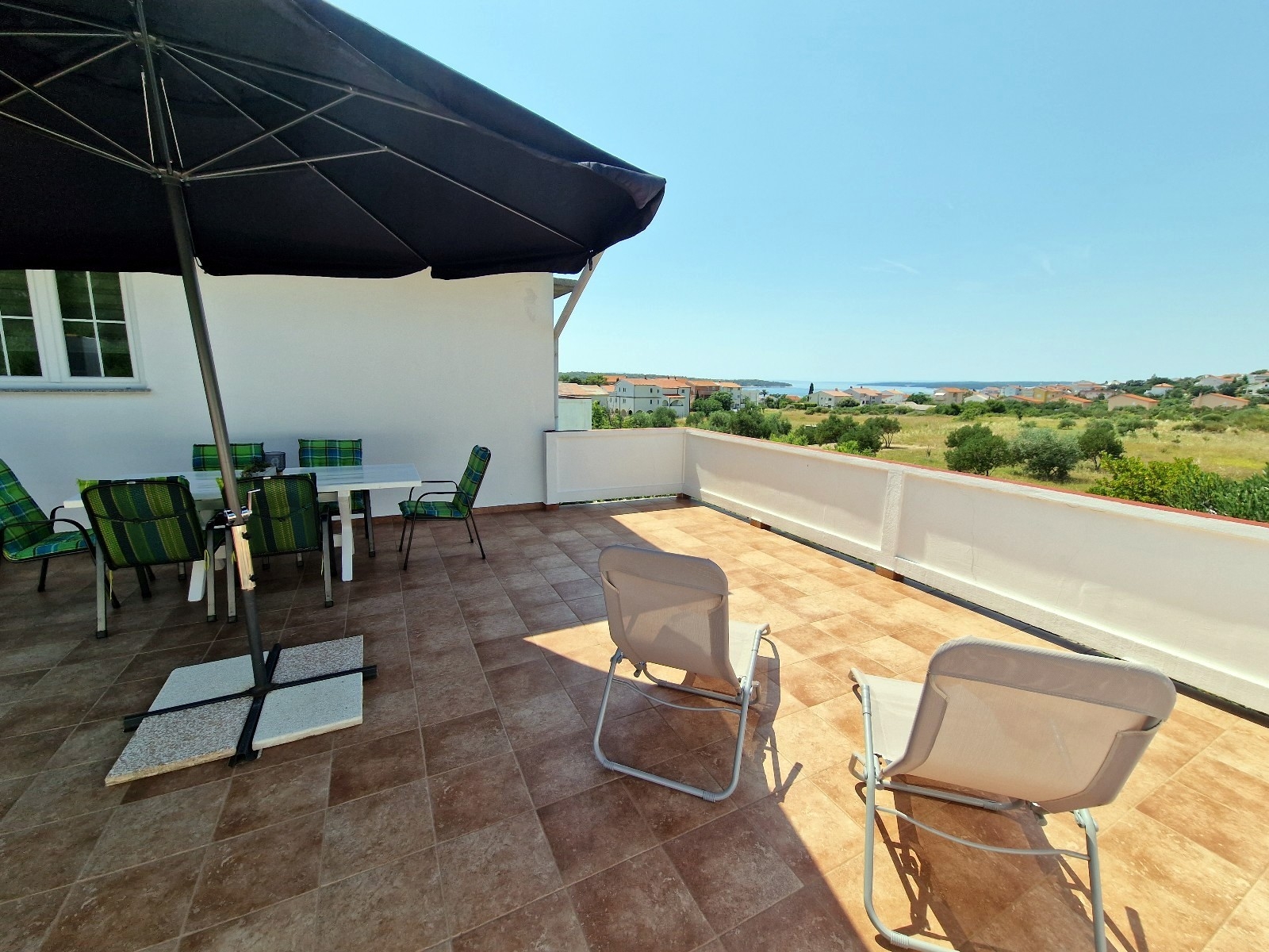 Two bedroom apartment with terrace and sea view Barbat, Rab  A-a