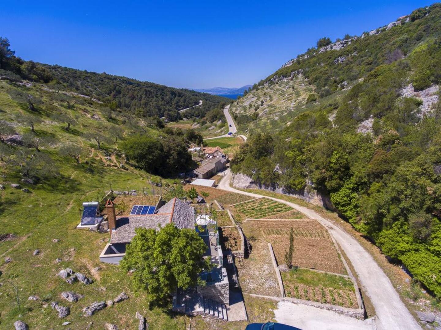Jednosobna kuća s terasom Postira, Brač  K