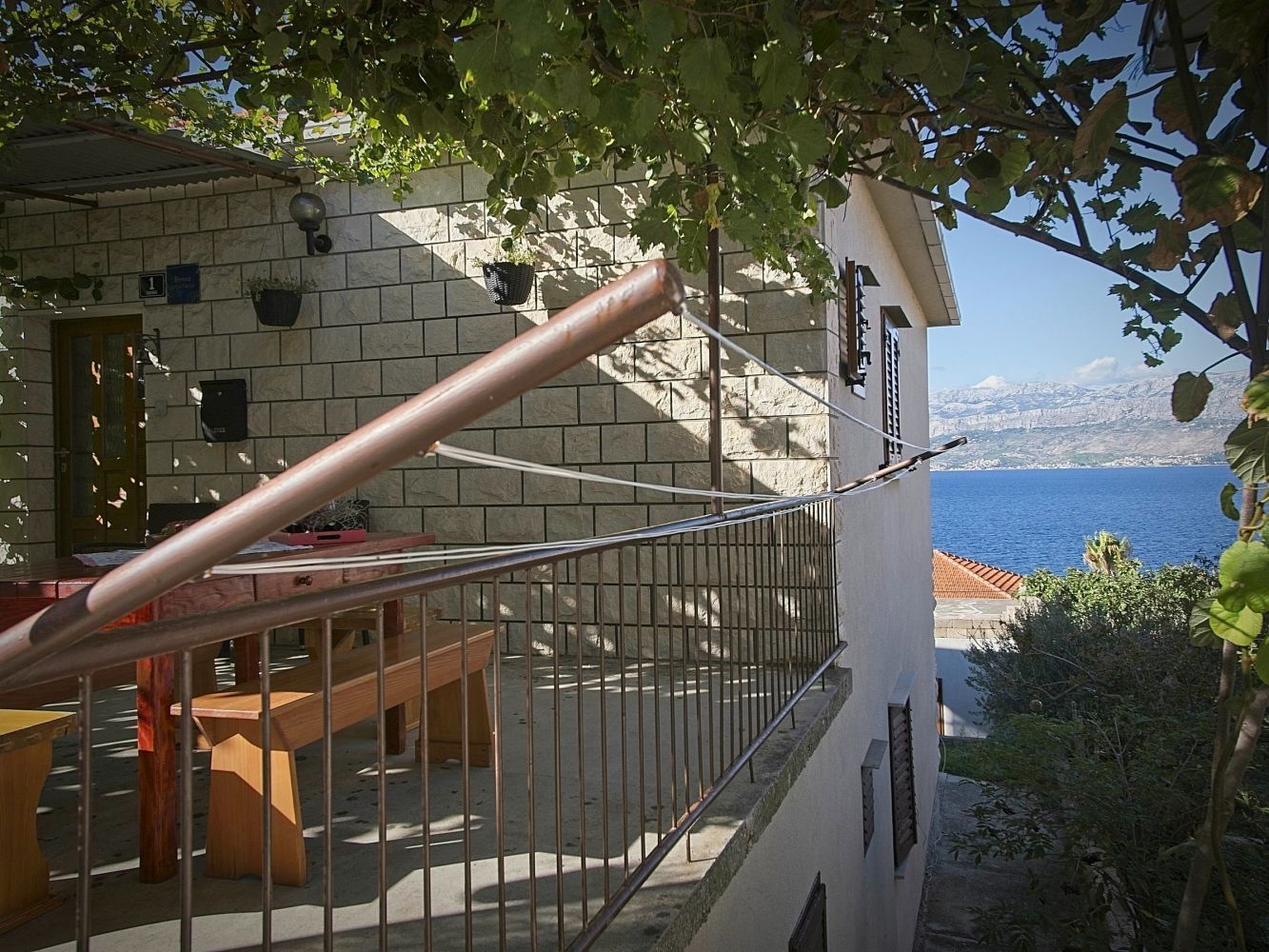 Three bedroom apartment with terrace and sea view Postira, Brač  A-a