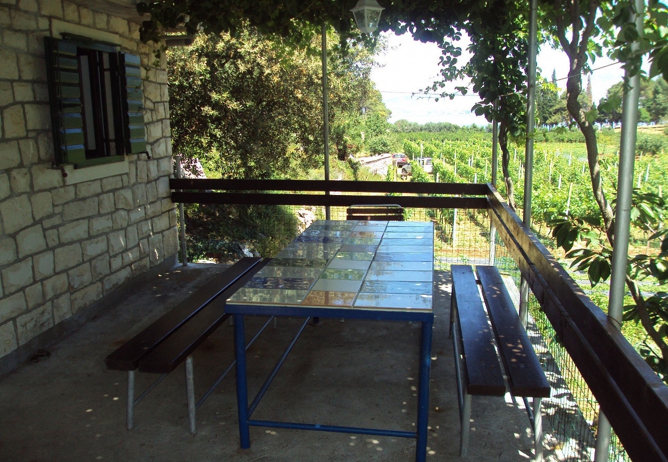 Two bedroom house with terrace Postira, Brač  K