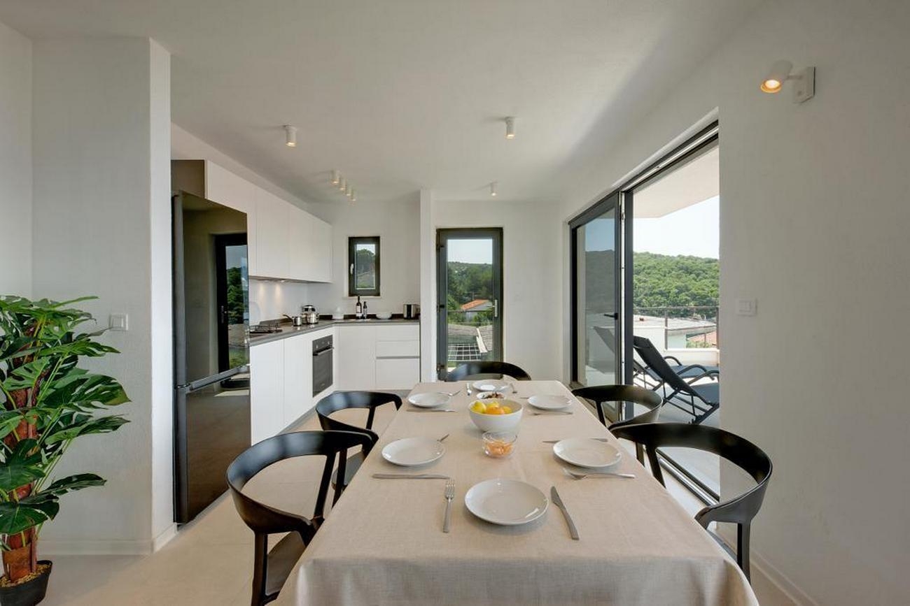 Two bedroom apartment with terrace and sea view Postira, Brač  A-b