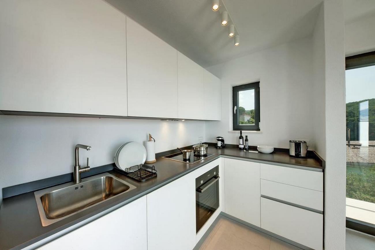 Two bedroom apartment with terrace and sea view Postira, Brač  A-b