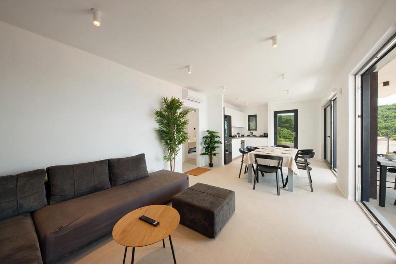 Two bedroom apartment with terrace and sea view Postira, Brač  A-b