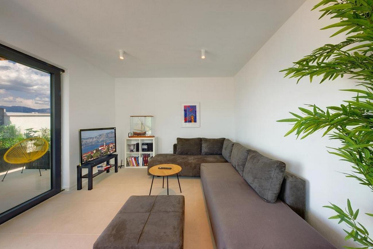 Two bedroom apartment with terrace and sea view Postira, Brač  A-b