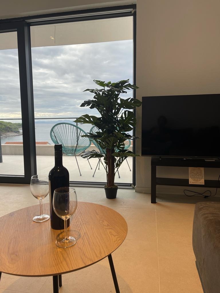 Two bedroom apartment with terrace and sea view Postira, Brač  A-b