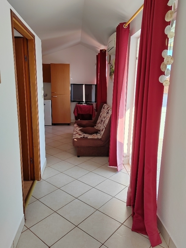 Two bedroom apartment with terrace and sea view Barbat, Rab  A-c