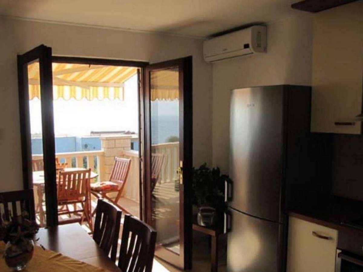 Two bedroom apartment with terrace and sea view Sućuraj, Hvar (A-22239-a)