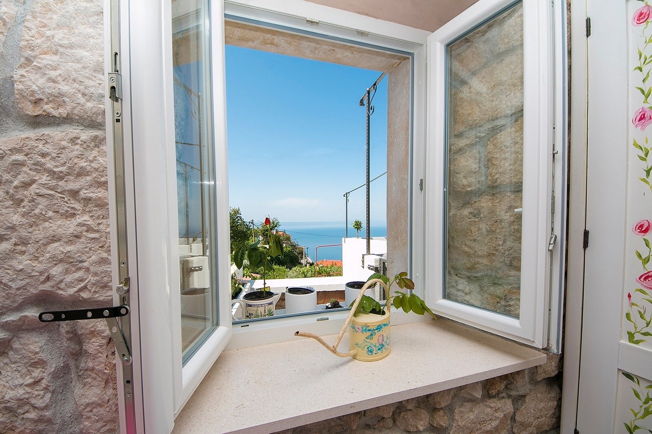One bedroom house with terrace and sea view Gornja Podgora, Makarska  K