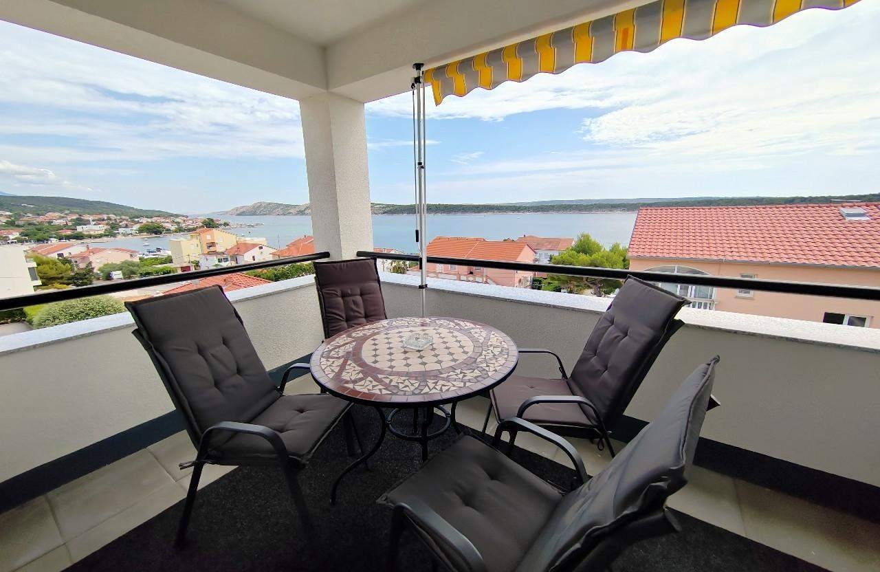 Two bedroom apartment with balcony and sea view Barbat, Rab (A-22251-a)