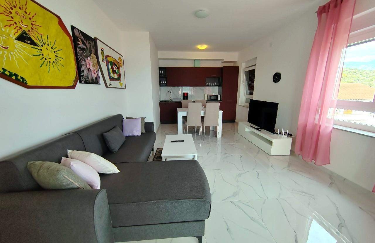 Two bedroom apartment with balcony and sea view Barbat, Rab (A-22251-a)