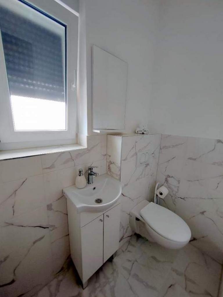 Two bedroom apartment with balcony and sea view Barbat, Rab  A-b