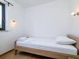 Sypialnia 2 Premantura, Sypialnia 2 w zakwaterowaniu typu apartment, zwierzęta domowe są dozwolone i WiFi.