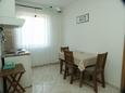 Dining room Peroj, Dining room in the apartment, (pet friendly) and WiFi.