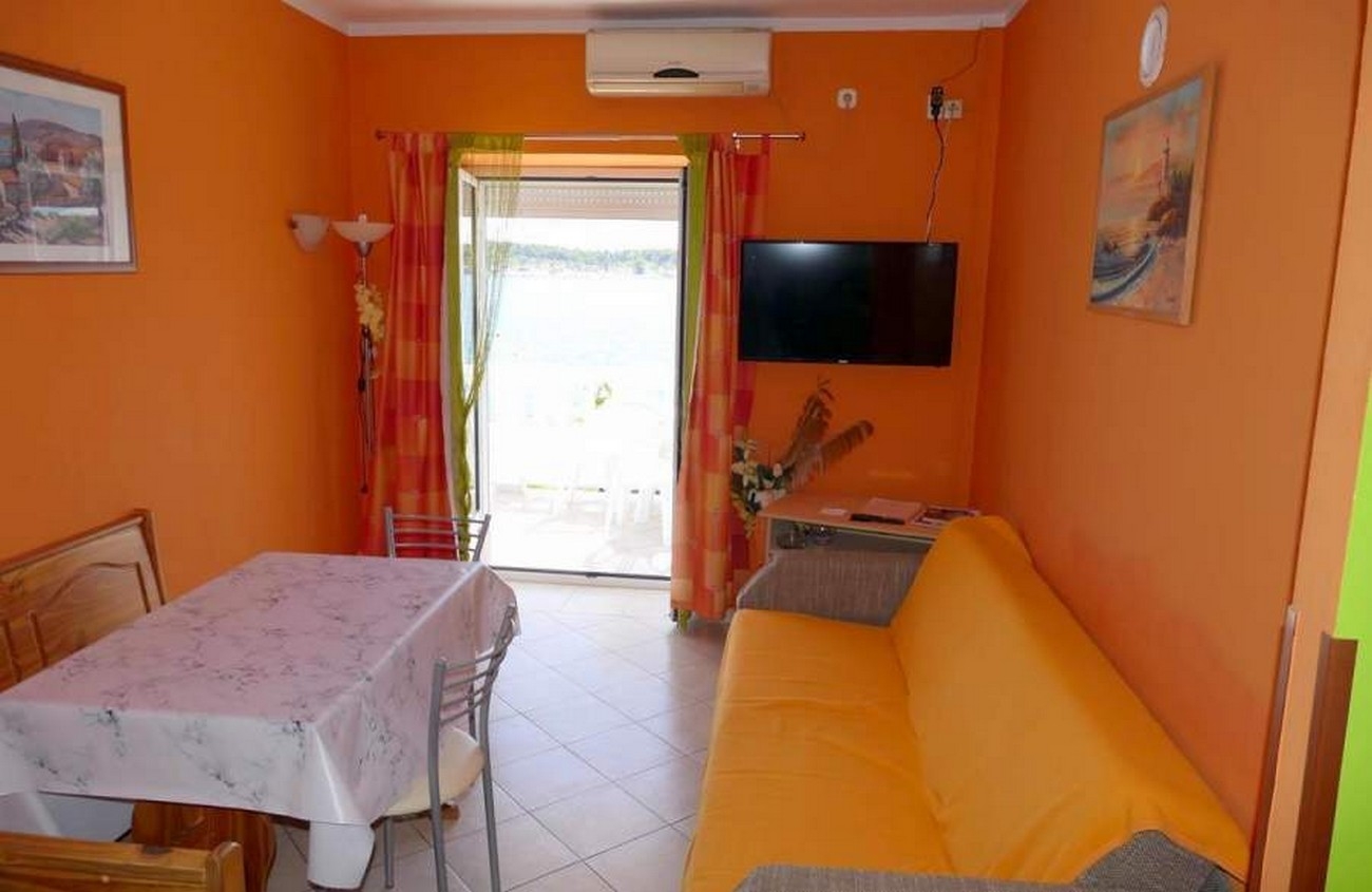 Two bedroom apartment near beach Barbat, Rab (A-22363-b)