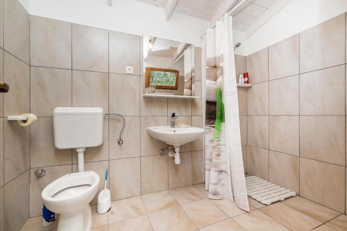 Two bedroom house with terrace and sea view Cove Mikavica, Žirje  K