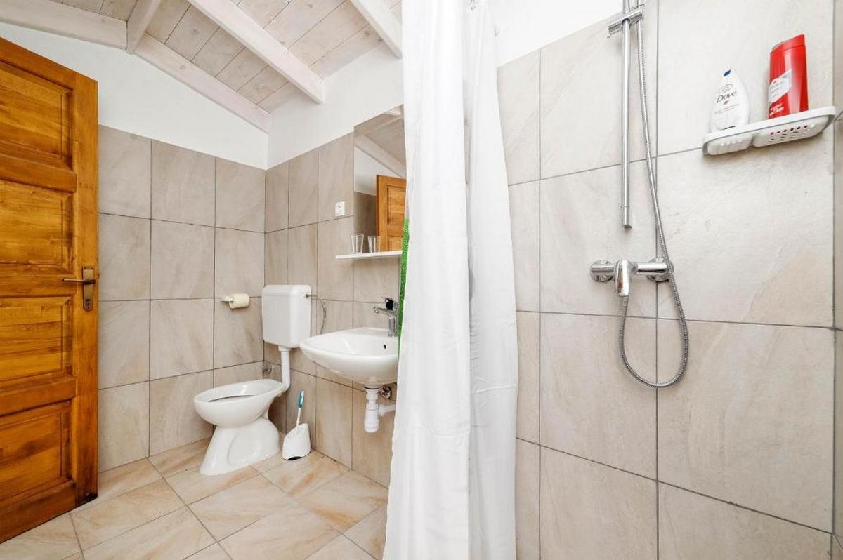 Two bedroom house with terrace and sea view Cove Mikavica, Žirje  K