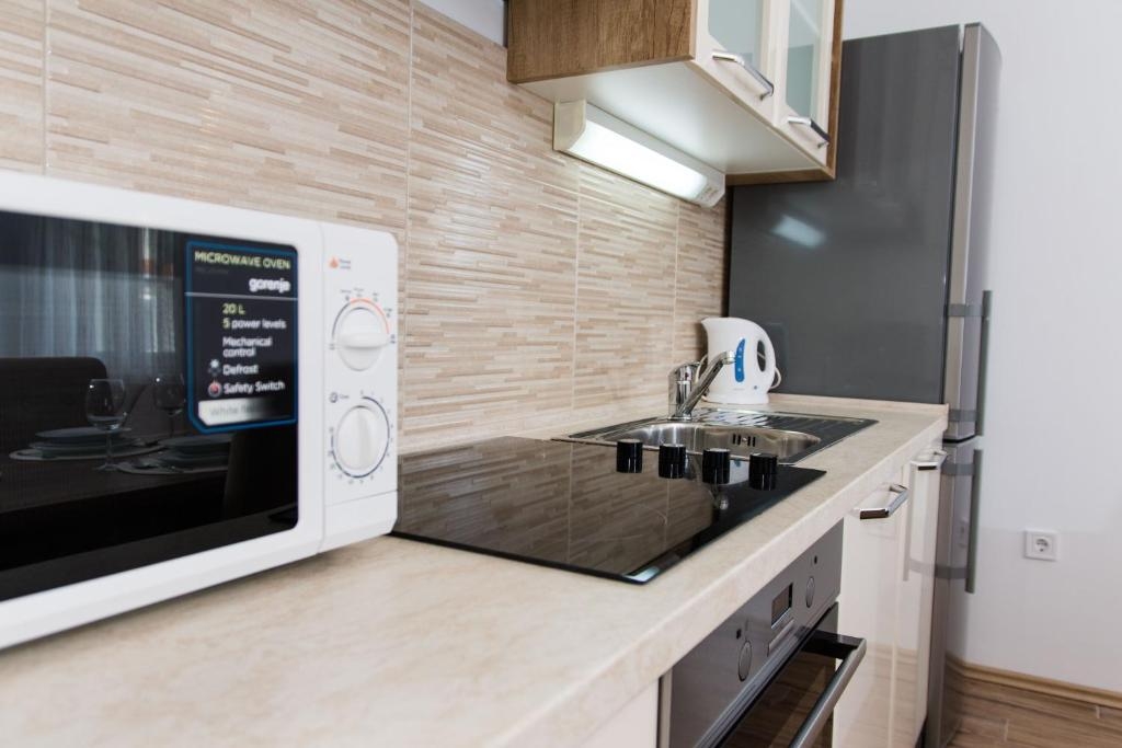 One bedroom apartment with balcony and sea view Kaštel Novi, Kaštela  A-a