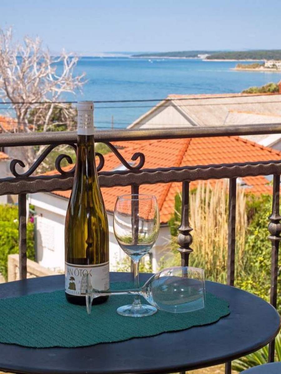 Three bedroom house with terrace and sea view Barbat, Rab  K