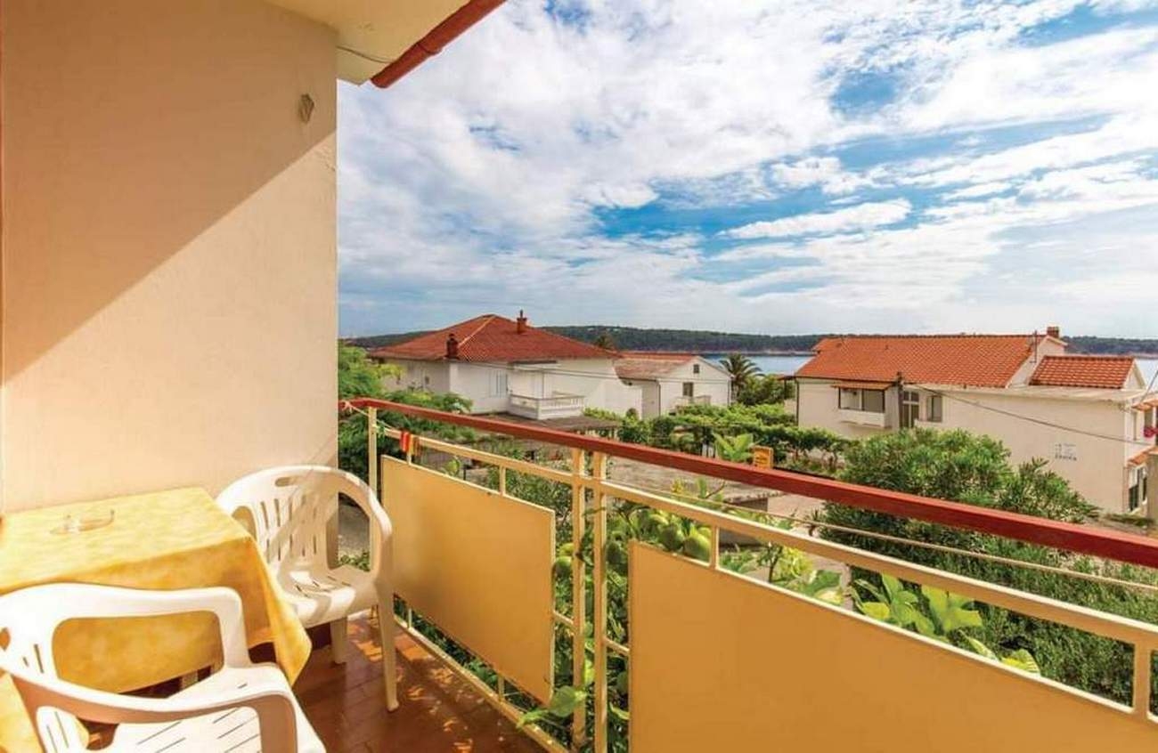 Two bedroom apartment with balcony and sea view Barbat, Rab  A-a